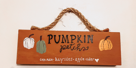 Hanging pumpkin sign